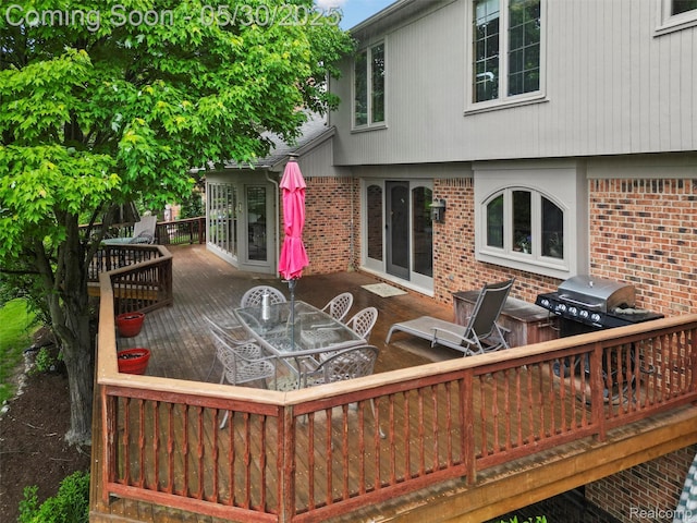 1552 Pebble Creek Dr, Rochester, MI 48307 - wooden deck featuring outdoor dining area and a grill
