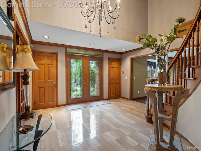 1552 Pebble Creek Dr, Rochester, MI 48307 - foyer with baseboards, a towering ceiling, ornamental molding, a chandelier, and stairway