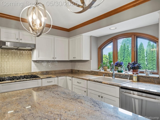 1552 Pebble Creek Dr, Rochester, MI 48307 - kitchen featuring stainless steel dishwasher, a sink, under cabinet range hood, crown molding, and a chandelier