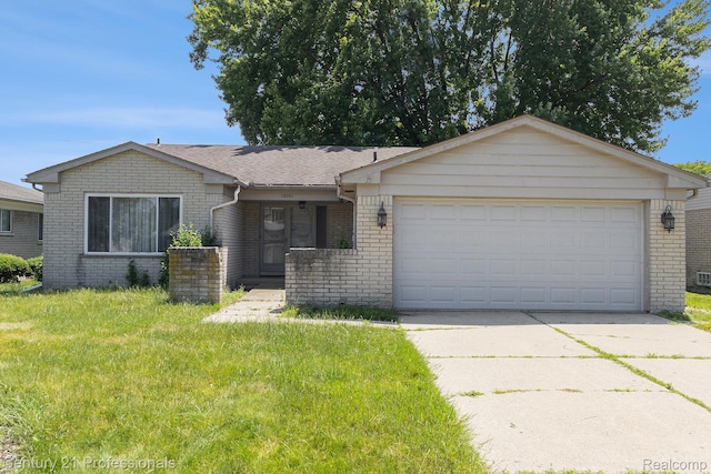 18201 Filmore St, Southfield, MI 48075 - single story home featuring brick siding, concrete driveway, an attached garage, and a front yard