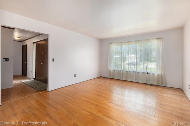 18201 Filmore St, Southfield, MI 48075 - spare room featuring light wood-style flooring and baseboards