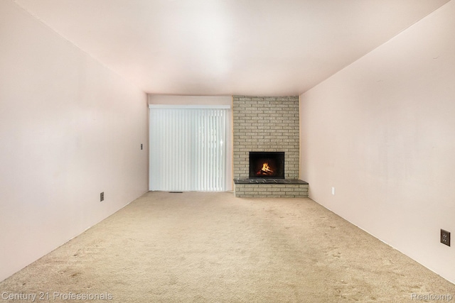 18201 Filmore St, Southfield, MI 48075 - unfurnished living room featuring carpet flooring and a fireplace
