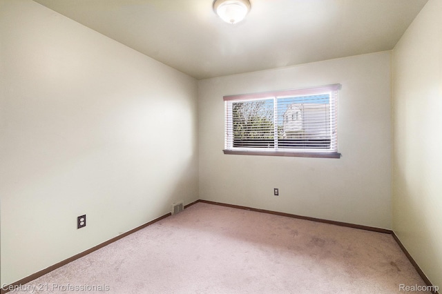18201 Filmore St, Southfield, MI 48075 - spare room with light carpet and baseboards
