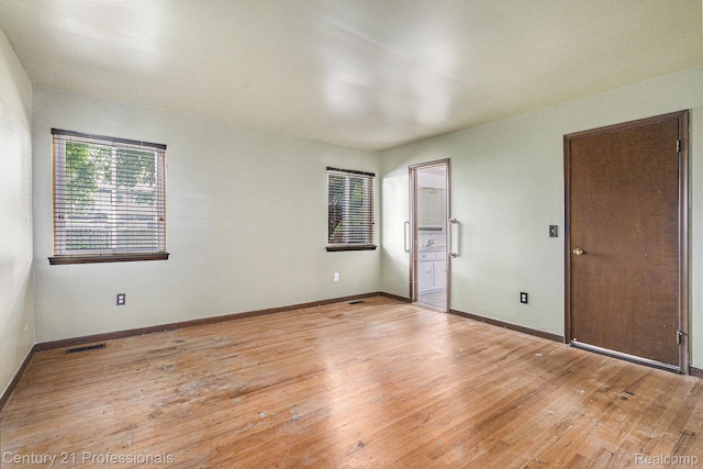 18201 Filmore St, Southfield, MI 48075 - spare room with light wood-style flooring and baseboards