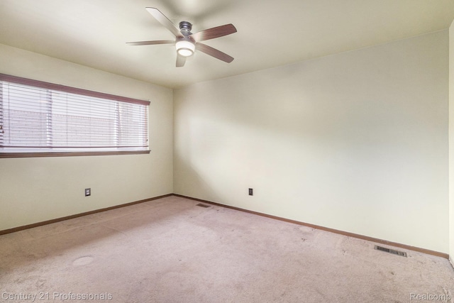 18201 Filmore St, Southfield, MI 48075 - empty room featuring light carpet and ceiling fan