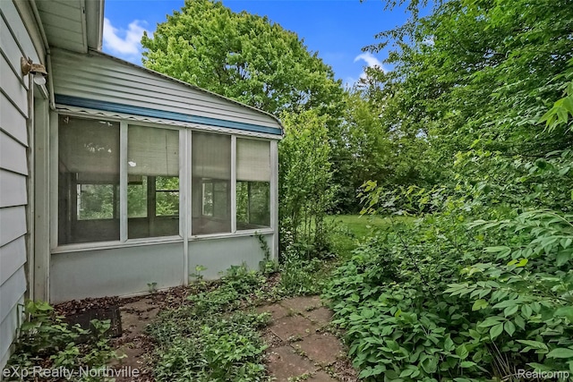 37923 Howell St, Livonia, MI 48154 - view of home's exterior featuring a sunroom