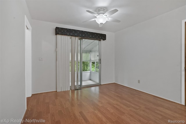 37923 Howell St, Livonia, MI 48154 - empty room featuring ceiling fan and wood finished floors
