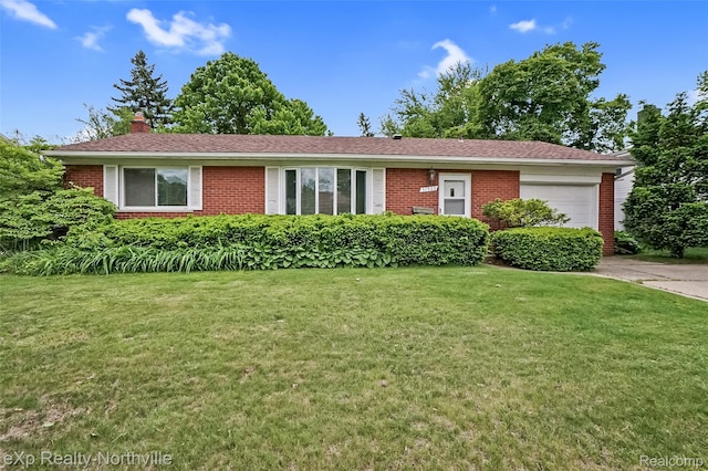 37923 Howell St, Livonia, MI 48154 - ranch-style house featuring brick siding, an attached garage, a front lawn, and a chimney