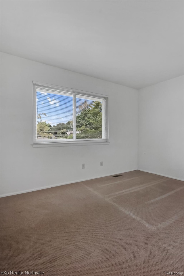 37923 Howell St, Livonia, MI 48154 - unfurnished room with carpet flooring and baseboards