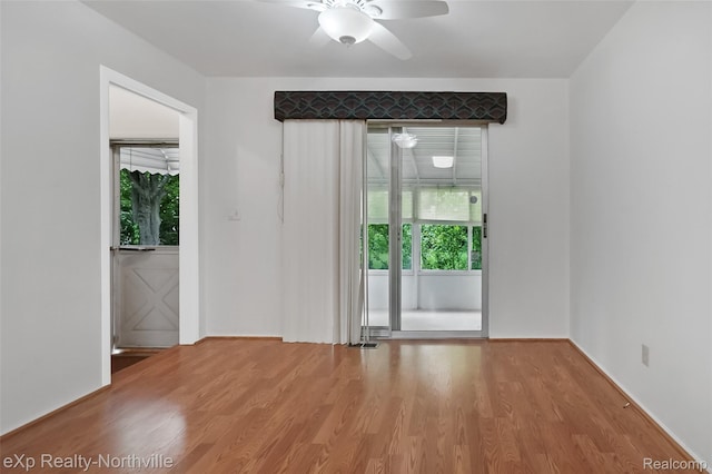 37923 Howell St, Livonia, MI 48154 - spare room with healthy amount of natural light, wood finished floors, and a ceiling fan
