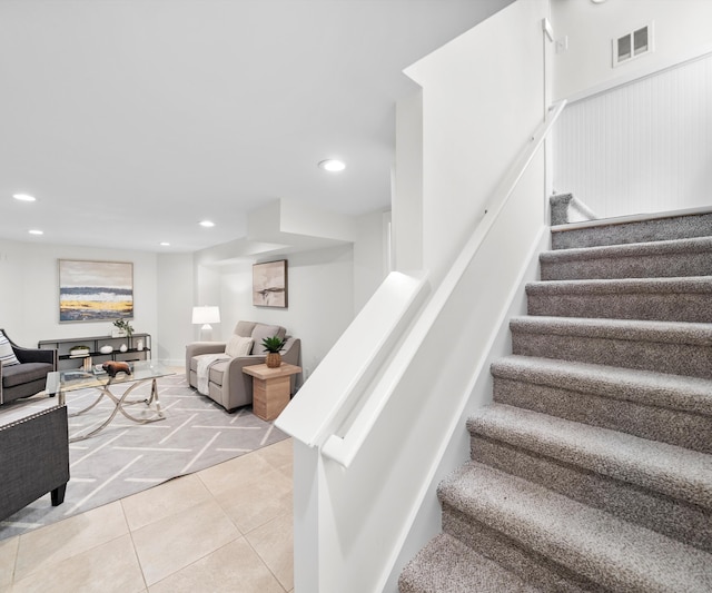 1015 Lincoln Ave, Ann Arbor, MI 48104 - staircase featuring tile patterned floors and recessed lighting
