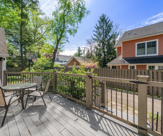 1015 Lincoln Ave, Ann Arbor, MI 48104 - deck with outdoor dining area and a fenced backyard