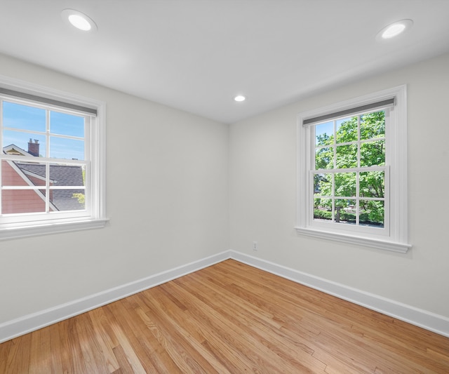 1015 Lincoln Ave, Ann Arbor, MI 48104 - spare room featuring baseboards, light wood-style flooring, and recessed lighting