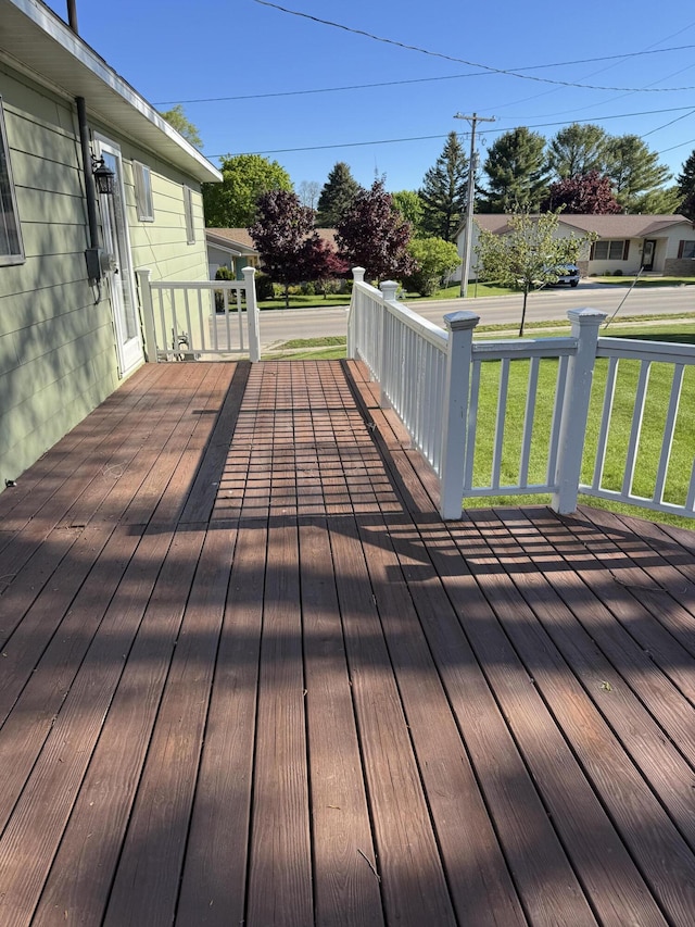 1235 Princeton St, Manistee, MI 49660 - deck featuring a yard