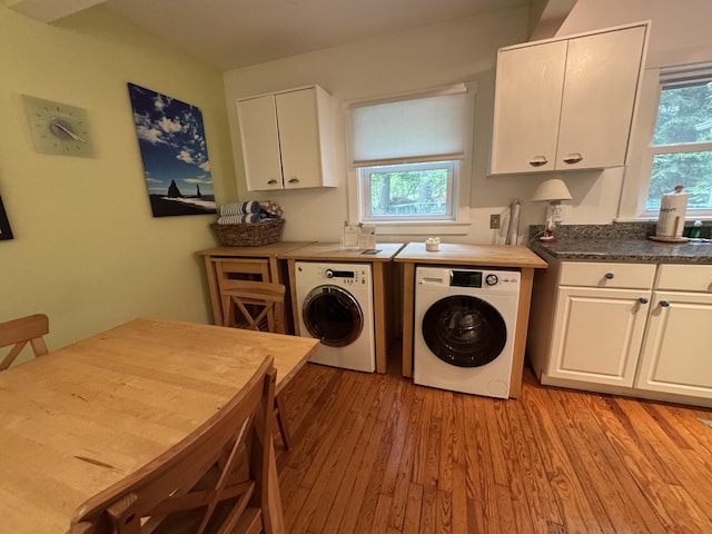 31 Mohawk Trl, New Buffalo, MI 49117 - laundry room with washing machine and clothes dryer, cabinet space, and light wood-style flooring