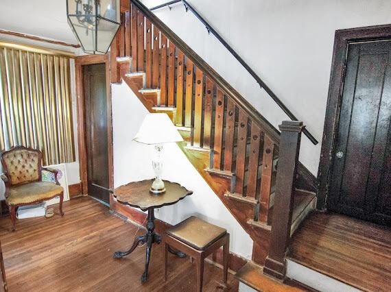 2041 Atkinson St, Detroit, MI 48206 - staircase with wood finished floors