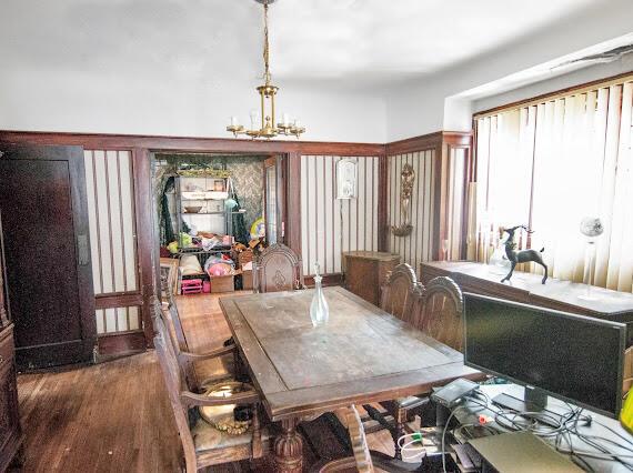 2041 Atkinson St, Detroit, MI 48206 - dining room with a chandelier and wood finished floors