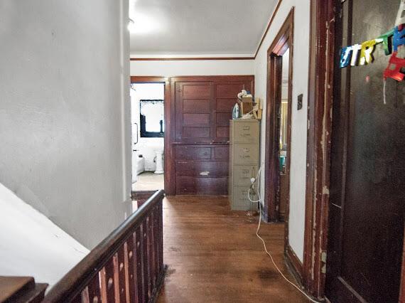 2041 Atkinson St, Detroit, MI 48206 - corridor featuring wood finished floors