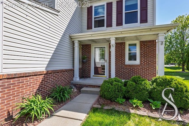 6420 Crestview Dr, Holly, MI 48442 - entrance to property featuring brick siding