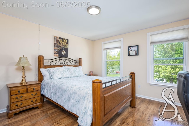 6420 Crestview Dr, Holly, MI 48442 - bedroom featuring wood finished floors and baseboards