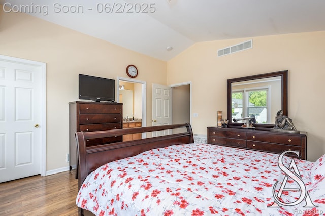 6420 Crestview Dr, Holly, MI 48442 - bedroom featuring lofted ceiling and wood finished floors