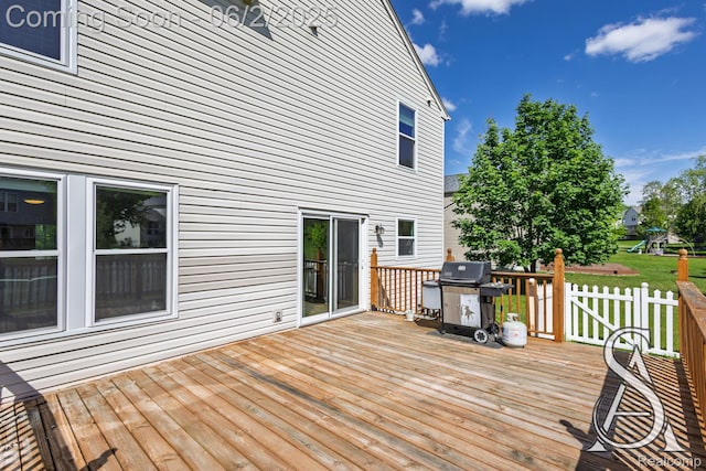 6420 Crestview Dr, Holly, MI 48442 - wooden deck featuring a grill and a yard