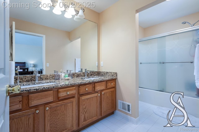 6420 Crestview Dr, Holly, MI 48442 - bathroom with tile patterned floors, double vanity, and shower / bath combination with glass door