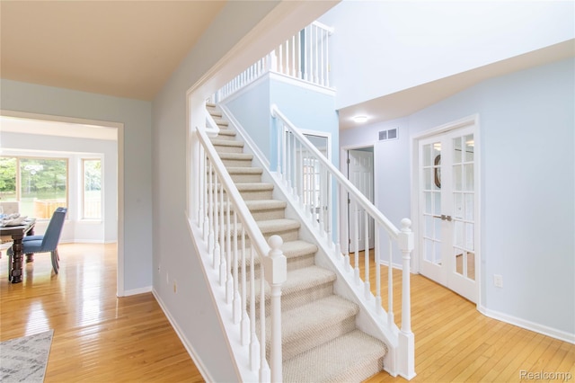 2864 Mystic Dr, Ann Arbor, MI 48103 - stairway with hardwood / wood-style floors and baseboards