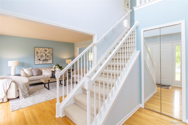2864 Mystic Dr, Ann Arbor, MI 48103 - stairs with wood finished floors and baseboards