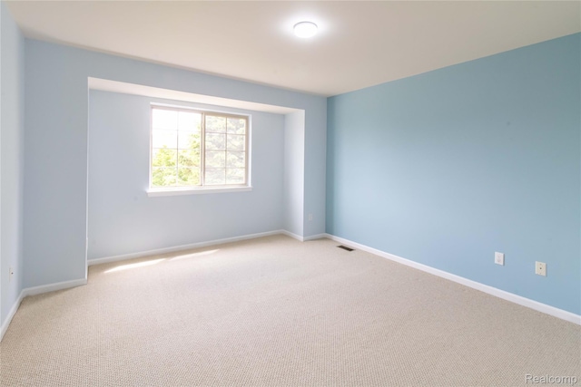 2864 Mystic Dr, Ann Arbor, MI 48103 - unfurnished room featuring light colored carpet and baseboards
