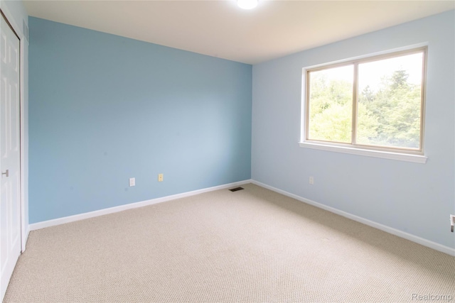2864 Mystic Dr, Ann Arbor, MI 48103 - empty room with light colored carpet and baseboards
