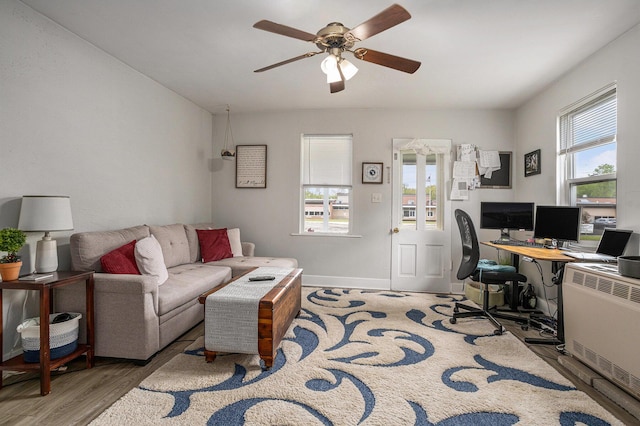 510 Cedar St, Paw Paw, MI 49079 - office area featuring ceiling fan, wood finished floors, and baseboards