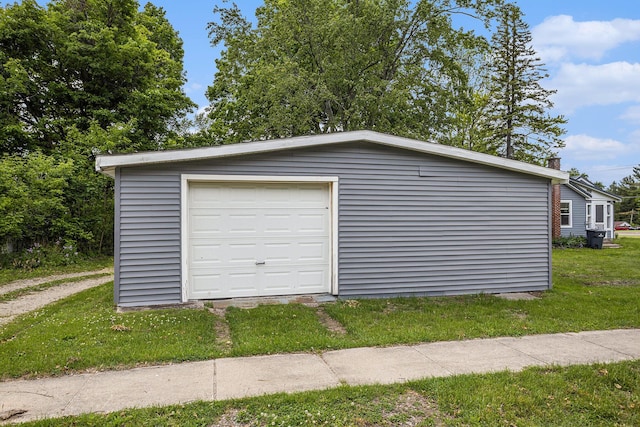 510 Cedar St, Paw Paw, MI 49079 - detached garage featuring driveway