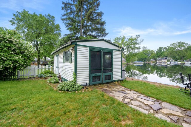 92282 Entrance Dr, Lawton, MI 49065 - view of outdoor structure with a water view