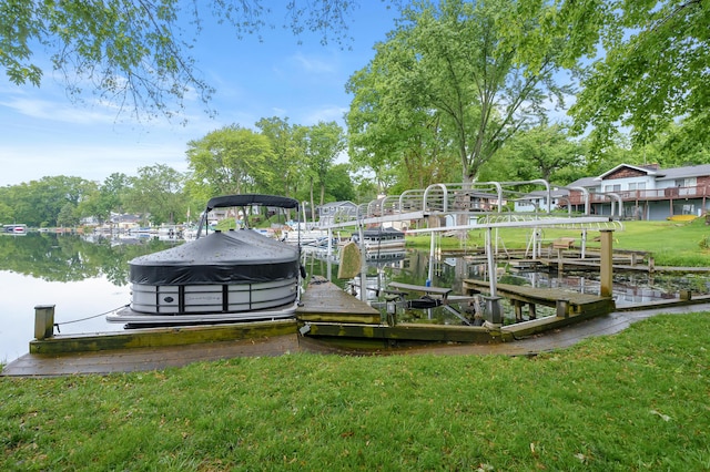 92282 Entrance Dr, Lawton, MI 49065 - dock with a water view, boat lift, and a yard
