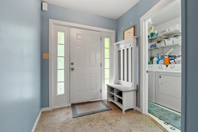 92282 Entrance Dr, Lawton, MI 49065 - carpeted entrance foyer with washing machine and dryer and baseboards