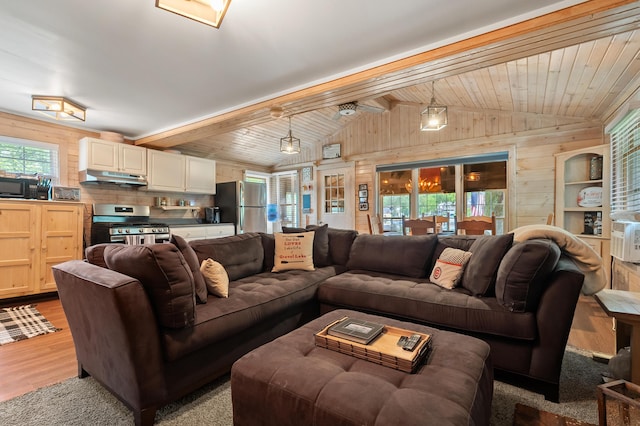 92282 Entrance Dr, Lawton, MI 49065 - living room with wood walls and light wood-style flooring