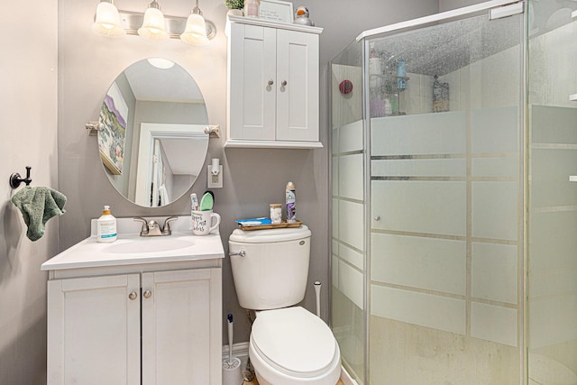 128 S Main St, Lawton, MI 49065 - full bathroom featuring toilet, a stall shower, and vanity