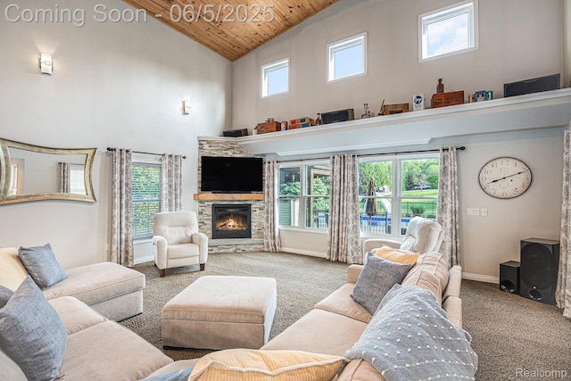 6080 Waldon Rd, Clarkston, MI 48346 - carpeted living area featuring high vaulted ceiling, wood ceiling, plenty of natural light, a fireplace, and baseboards