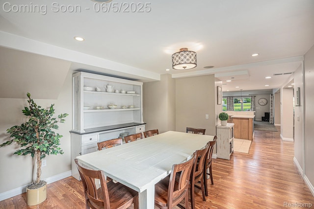 6080 Waldon Rd, Clarkston, MI 48346 - dining space with light wood finished floors, baseboards, and recessed lighting