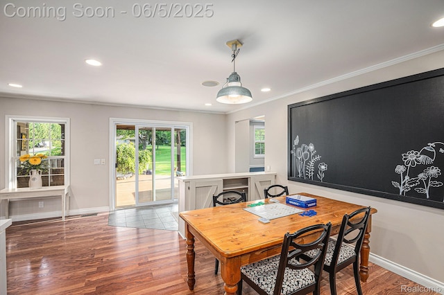 6080 Waldon Rd, Clarkston, MI 48346 - dining area with crown molding, recessed lighting, baseboards, and wood finished floors