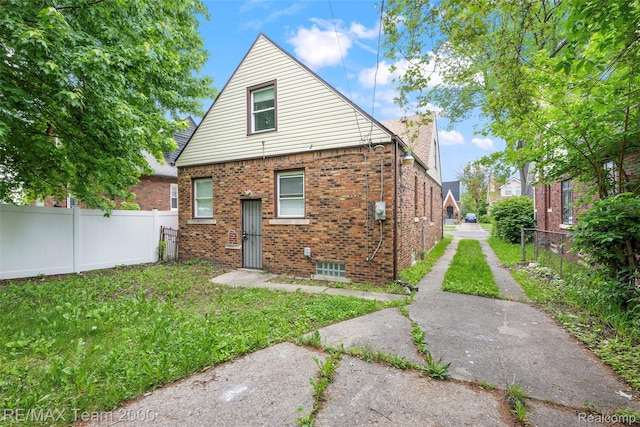 5935 Devonshire Rd, Dearborn, MI 48224 - rear view of property with brick siding