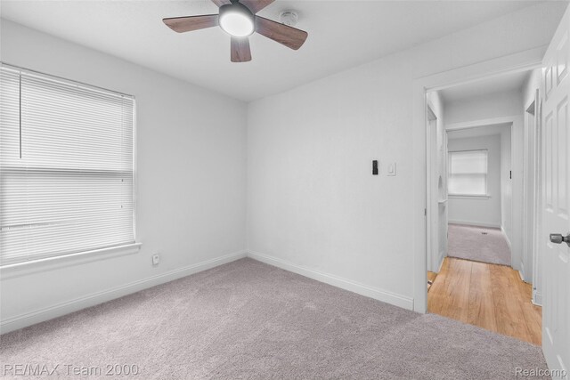5935 Devonshire Rd, Dearborn, MI 48224 - empty room featuring light carpet, a ceiling fan, baseboards, and a smoke detector