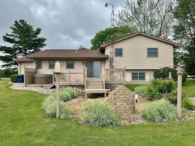 19379 Lincoln Rd, New Lothrop, MI 48460 - rear view of house with a wooden deck and a yard