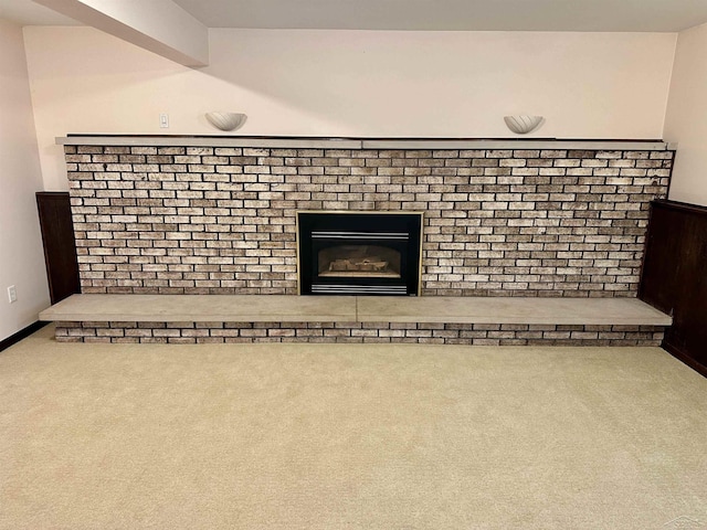 19379 Lincoln Rd, New Lothrop, MI 48460 - detailed view of carpet floors and a brick fireplace