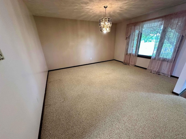 19379 Lincoln Rd, New Lothrop, MI 48460 - empty room with a chandelier, baseboards, and light colored carpet
