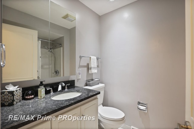 6461 Sheridan Rd, Saginaw, MI 48601 - full bath featuring toilet, a shower, vanity, and heating unit