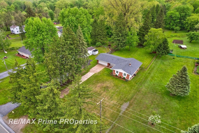 6461 Sheridan Rd, Saginaw, MI 48601 - view from above of property with a heavily wooded area