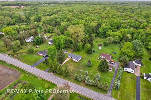 6461 Sheridan Rd, Saginaw, MI 48601 - aerial view of property and surrounding area with a forest