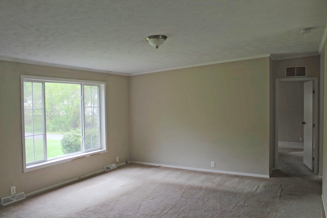 11200 Willard Rd, Burt, MI 48417 - unfurnished room featuring carpet, baseboards, crown molding, a smoke detector, and a textured ceiling